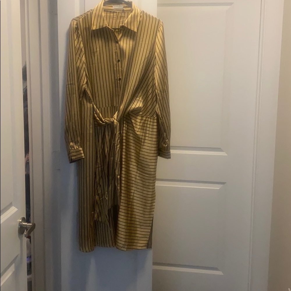 Black and gold high split fitted dress